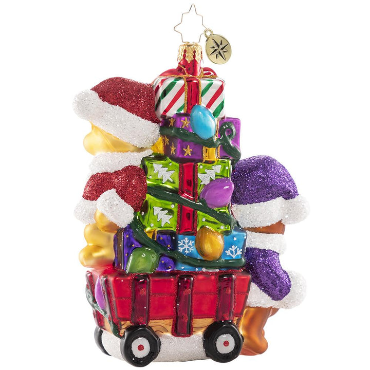 Back - Ornament Description - Toting Treasure Teddies: Wishing you a very bear-y Christmas! These precious plushies are riding in style on their little red wagon piled high with toys and Christmas joy!