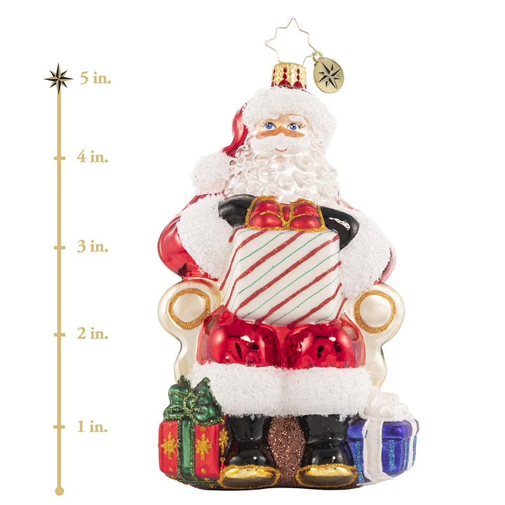 Ornament Description - Santa's Lap of Luxury: Santa relaxes on his signature velvet chair, ready to hear the wishes of countless good little boys and girls. Naughty or nice, Santa always delivers! This photo shows the ornament stands is about 5 inches tall. 