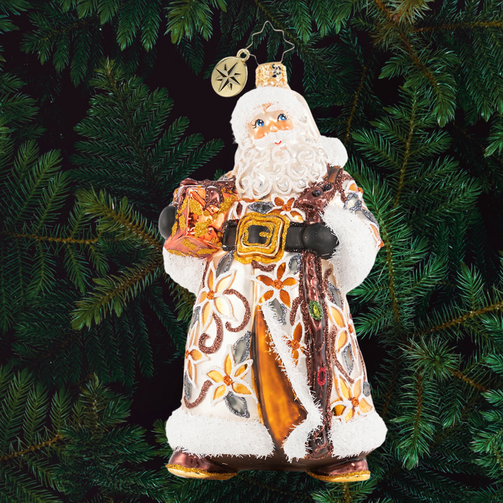 Ornament Description - Bountiful Basket Traveler: Santa has emerged from a long trek through the forest, carrying a heavy woven basket full of gifts to share. Nothing will stand in the way of Santa delivering every last bit of Christmas cheer!