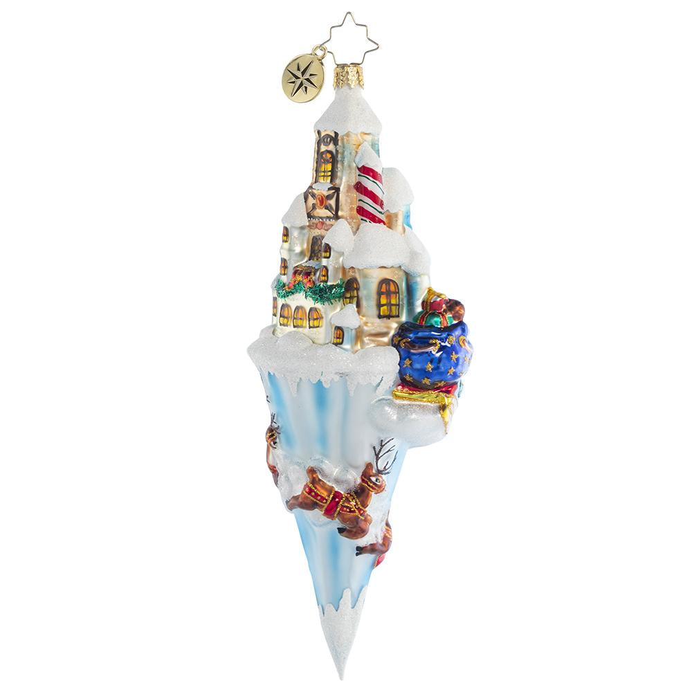 Back - Ornament Description - Paradise On Ice: Nestled in the heart of the North Pole, Santa's charming workshop is where all the Christmas magic happens. As the reindeer pull him into the night air, he watches it twinkle from above.