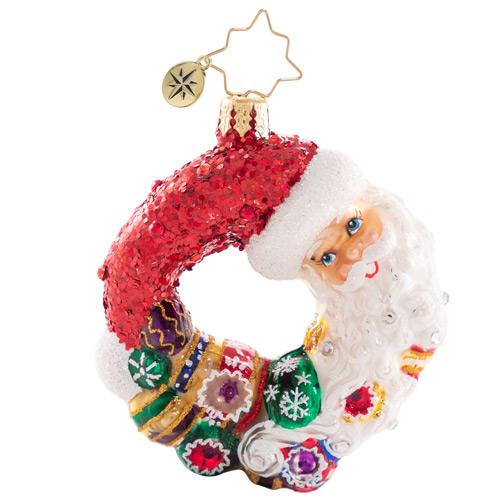 Front - Ornament Description - Santa Comes Full Circle Wreath Gem: Give love, get loveâ€¦no one knows this full circle of the season better than good old Saint Nick. This stunning miniature wreath includes Santa himself and some of the prized ornaments from his collection.