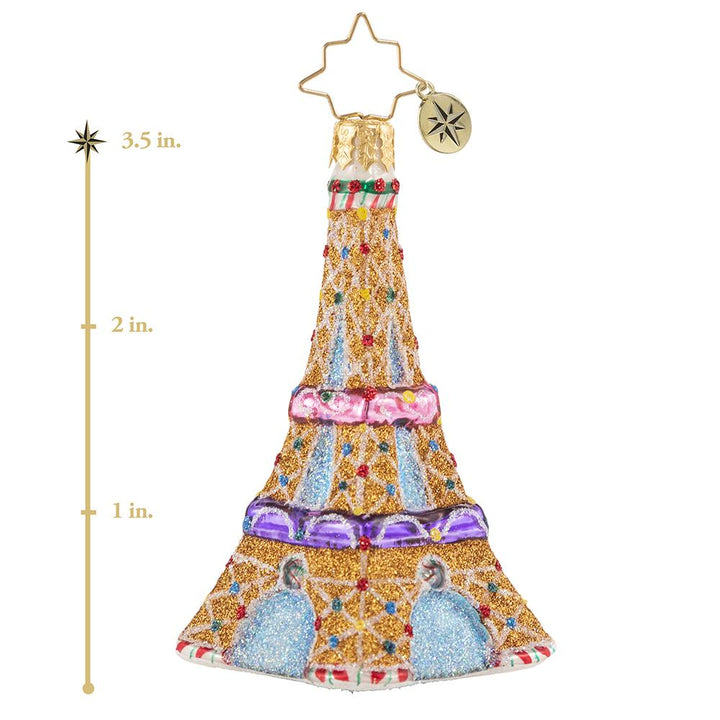 Ornament Description - Paris is Sweet Gem: Climb to the top, just imagine the view! This tiny gingerbread Eiffel Tower is a sweet Parisian dream come true! This photo shows the ornament is about 3.5 inches tall. 