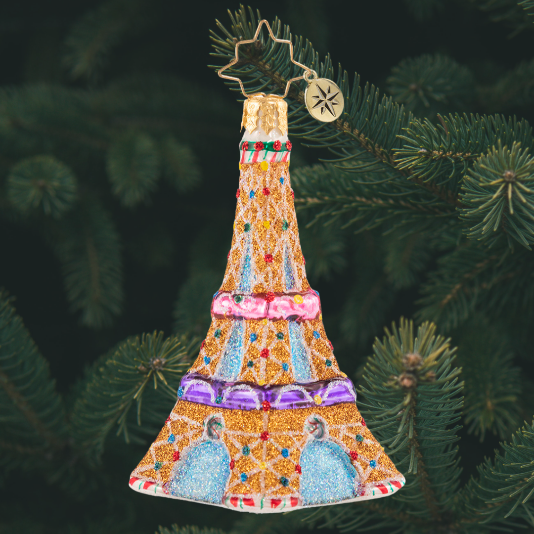 Ornament Description - Paris is Sweet Gem: Climb to the top, just imagine the view! This tiny gingerbread Eiffel Tower is a sweet Parisian dream come true!