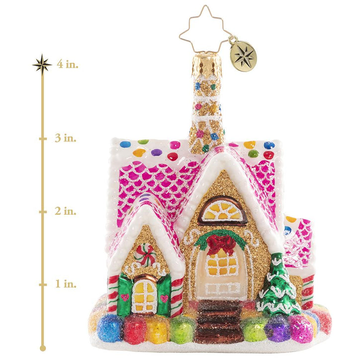 Ornament Description - A Delectable Dwelling Gem: Goody goody gumdrops! Adorned with sweetness on all sides, this itty-bitty gingerbread cottage is total candy-covered confection perfection. This photo shows the ornament is about 4 inches tall.