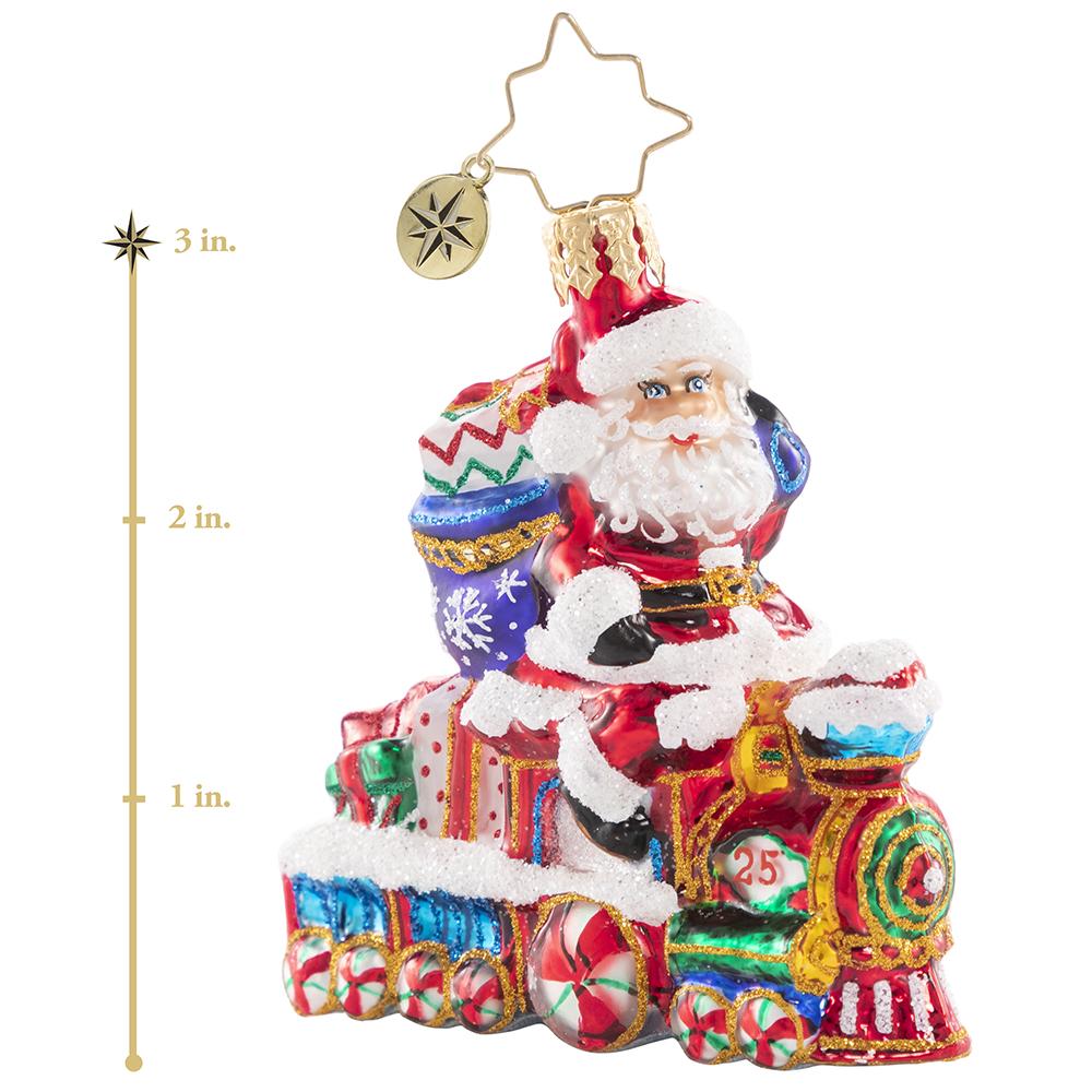 Ornament Description - On the Tracks Santa Gem: Choo chooâ€”it is the Holiday Express! Santa is all aboard on this little locomotive, on his way to spread Christmas cheer to one and all. This photo shows the ornament is about 3 inches tall. 