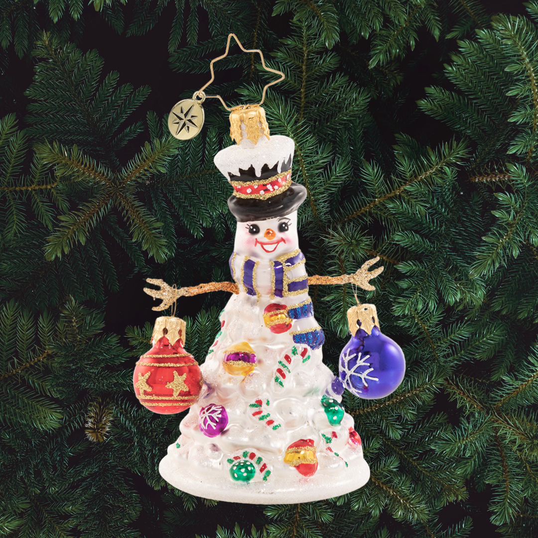 Ornament Description - Quite a Lively Tree Gem: Who needs a tree? Not our snowman friend, that is for sure! He is decked out for the season in his Christmas best, with arms outstretched for frosty holiday hugs!