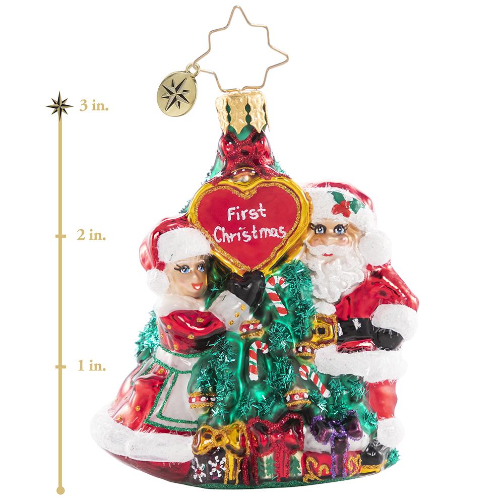 Ornament Description - The First Of Many Christmases Gem: It is a match made in holiday heaven! Wishing these little lovebirds the world as they celebrate their first Christmas together. This photo shows the ornament is about 3 inches tall. 