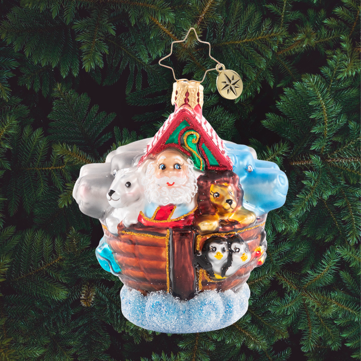 Ornament Description - Boarding Two by Two Gem: Lions, tigers, and bears -- oh my! Santa is sailing into this holiday season on an ark packed shoulder-to-shoulder with pairs of all his animal friends.