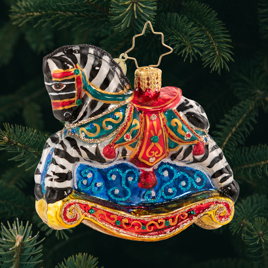 Ornament Description - Rocking In Stripes Gem: Black with white stripes, or white with black stripes? Whatever side you are on, it is clear this beauty is more than your average rocking horse!