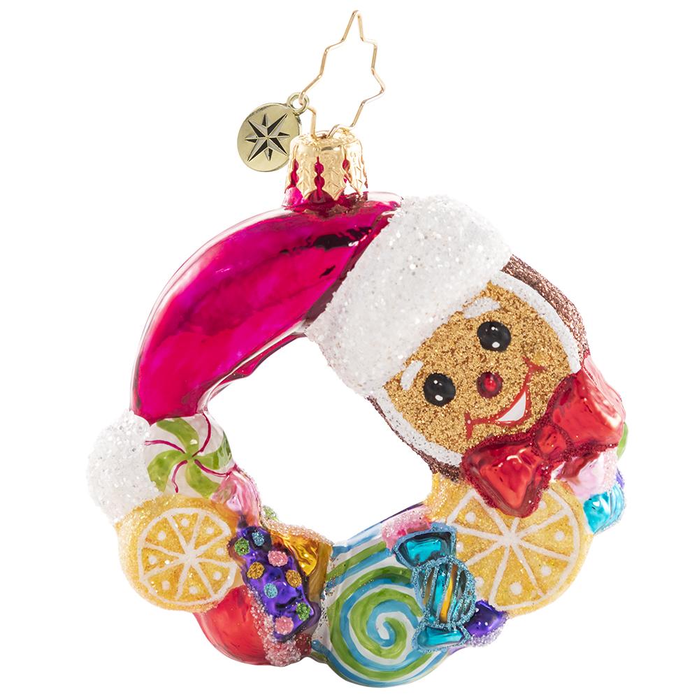 Front - Ornament Description - Swirling With Sweets Wreath Gem: Forget visions of sugarplumsâ€¦between all these swirling lemons, peppermints, and other treats this little gingerbread man is sure to have some very sweet dreams!