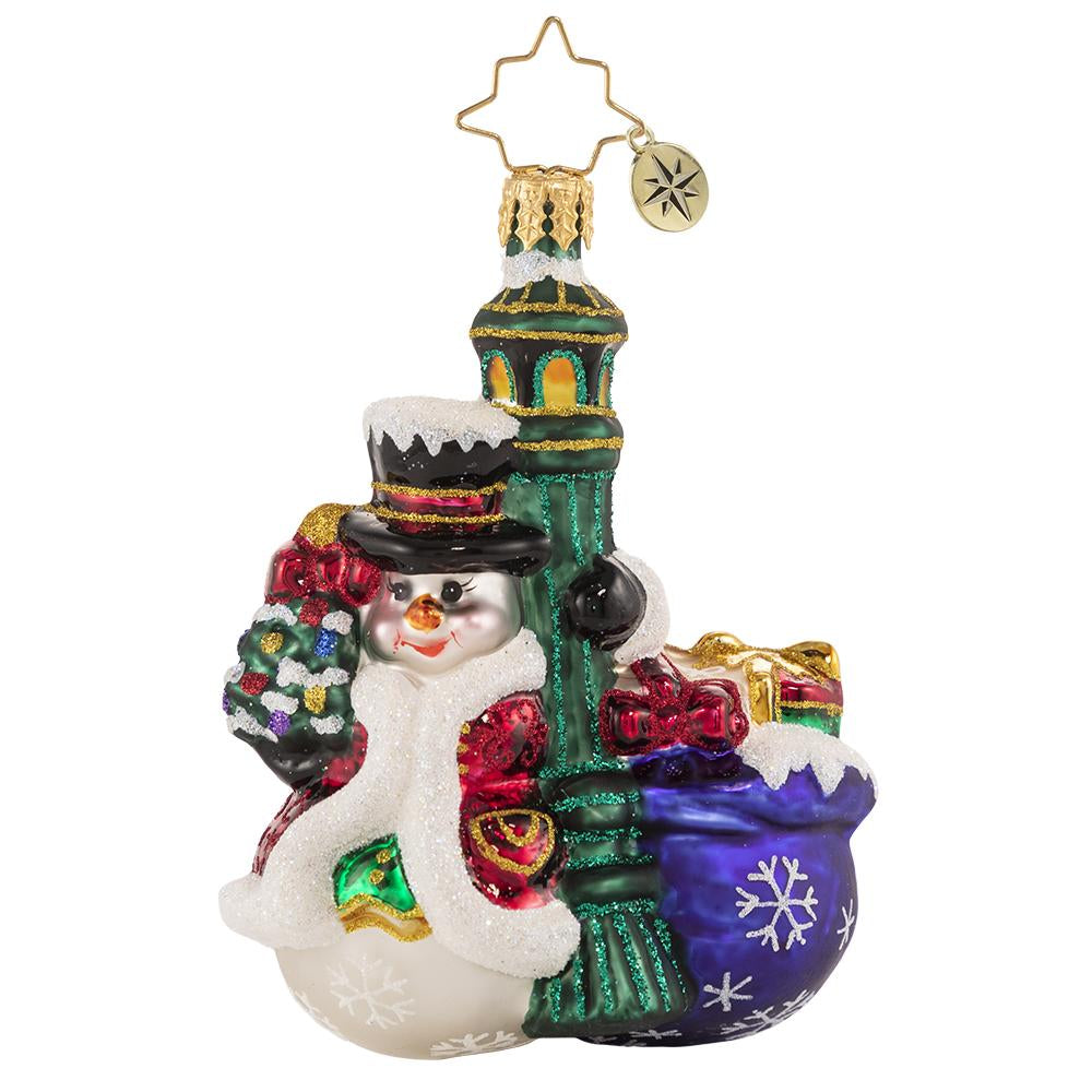 Front - Ornament Description - Swinging In The Rain Gem: Everyone's favorite snowman is turning heads in town. Each light pole that he passes, he cannot resist a little swing around!