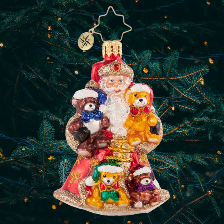Ornament Description - Flush With Plush Gem: We wish you a beary Christmas! Santa cradles his treasured teddy collection and is ready for a serious holiday hug-fest!