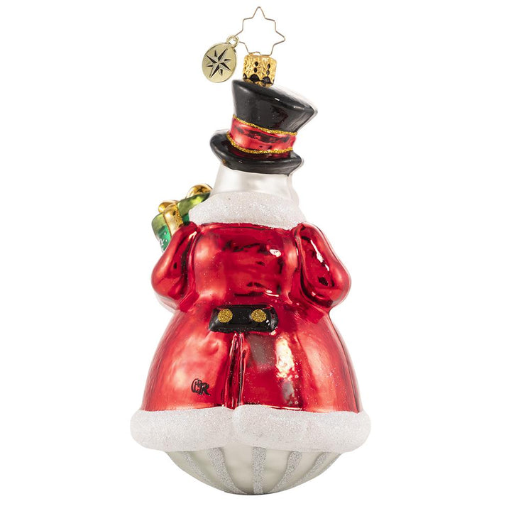 Back - Ornament Description - Counting the Minutes 'Til Christmas: It is the most wonderful time of the year! Frosty holds his trusty timepiece and keeps "watch" over all the North Pole holiday preparations. He just cannot wait for the big day!