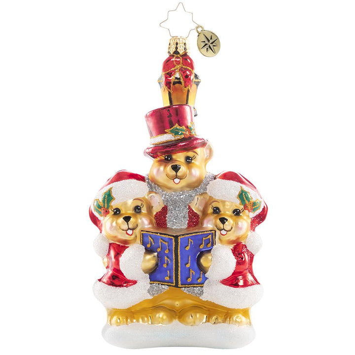 Front - Ornament Description - Introducing the Bear-I-Tones: They say the best way to spread Christmas cheer is singing loud for all to hear! These caroling cuties have gathered to make beautiful music for their peaceful village.