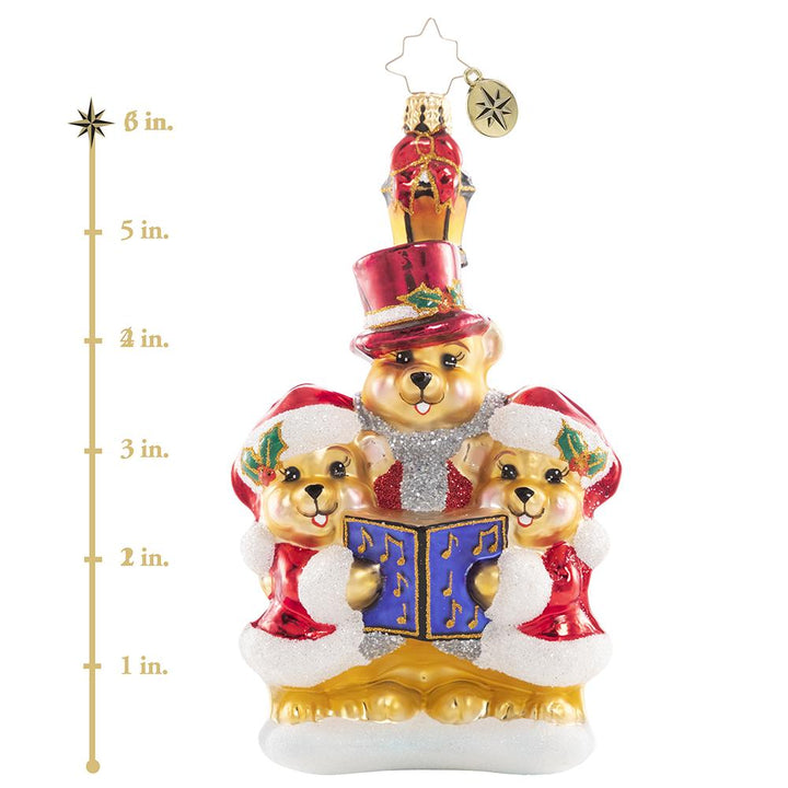 Ornament Description - Introducing the Bear-I-Tones: They say the best way to spread Christmas cheer is singing loud for all to hear! These caroling cuties have gathered to make beautiful music for their peaceful village. This photo shows the ornament is about 6 inches tall. 