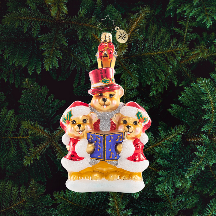 Ornament Description - Introducing the Bear-I-Tones: They say the best way to spread Christmas cheer is singing loud for all to hear! These caroling cuties have gathered to make beautiful music for their peaceful village.