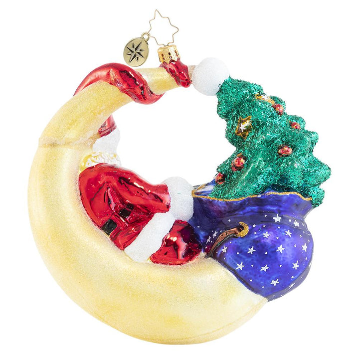 Back - Ornament Description - Over the Moon for Christman: Who knew that the man in the moon is actually Saint Nick himself? Santa takes a lunar lounge break on this festive crescent moon and enjoys the view from above.