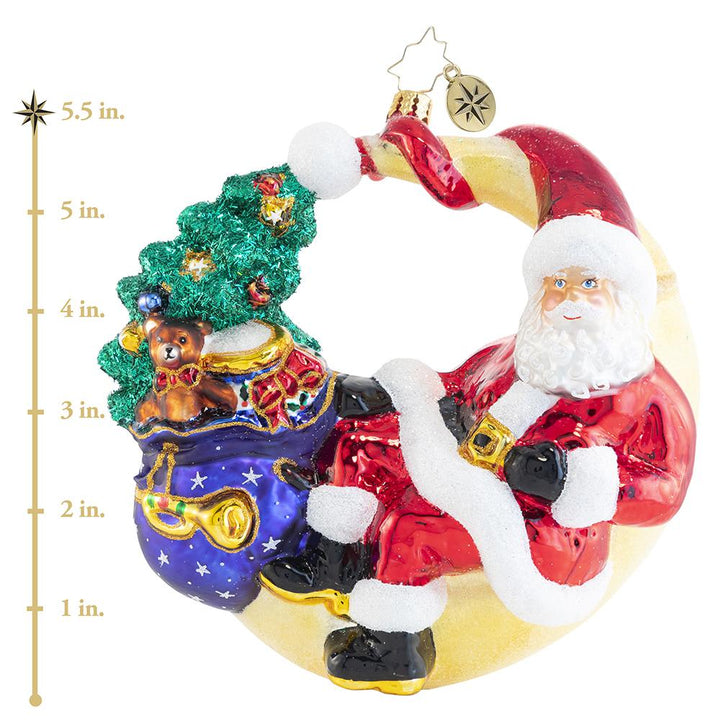 Ornament Description - Over the Moon for Christman: Who knew that the man in the moon is actually Saint Nick himself? Santa takes a lunar lounge break on this festive crescent moon and enjoys the view from above. This photo shows the ornament is about 5.5 inches tall. 