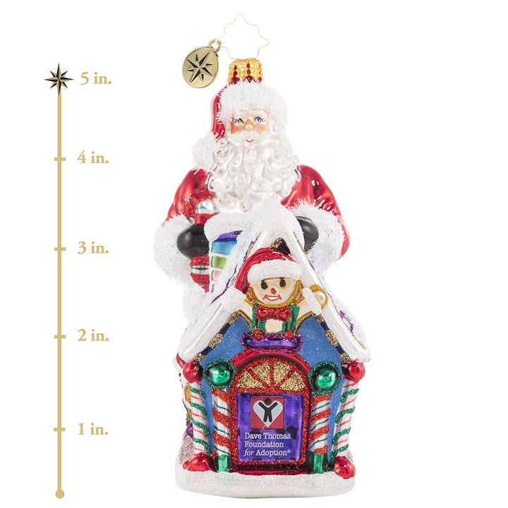 Ornament Description - Dave Thomas Adoption 2021: Santa's Christmas wish is for every child to have a home for the holidays, and a family to share the joy of the season with. Together we can help make that dream a reality! A percentage of the sales from this special ornament will benefit the Dave Thomas Foundation for Adoption. This photo shows the ornament is about 5 inches tall. 