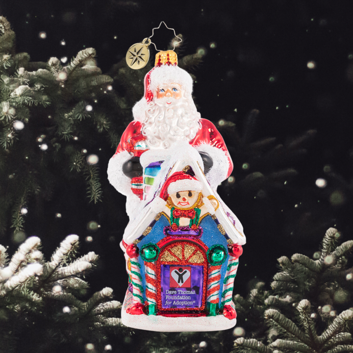 Ornament Description - Dave Thomas Adoption 2021: Santa's Christmas wish is for every child to have a home for the holidays, and a family to share the joy of the season with. Together we can help make that dream a reality! A percentage of the sales from this special ornament will benefit the Dave Thomas Foundation for Adoption.