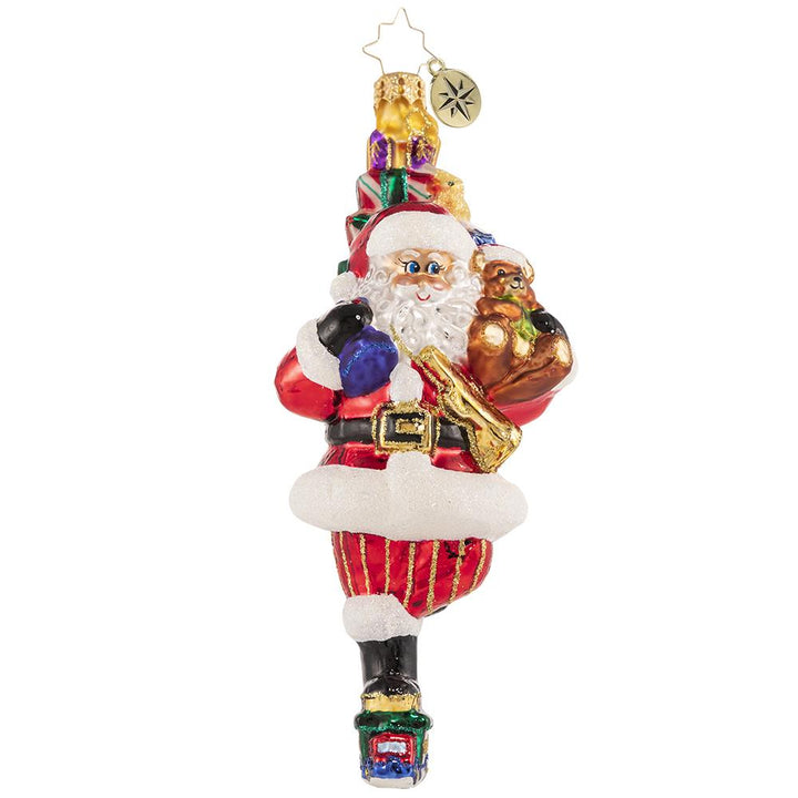 Front - Ornament Description - Traversing By Toy Truck: Does that thing have an engine? Always at the forefront of magical Christmas transportation trends, Santa tries something new; he gives this option a 7 for style, a 6 for speed, and a 10 for fun!
