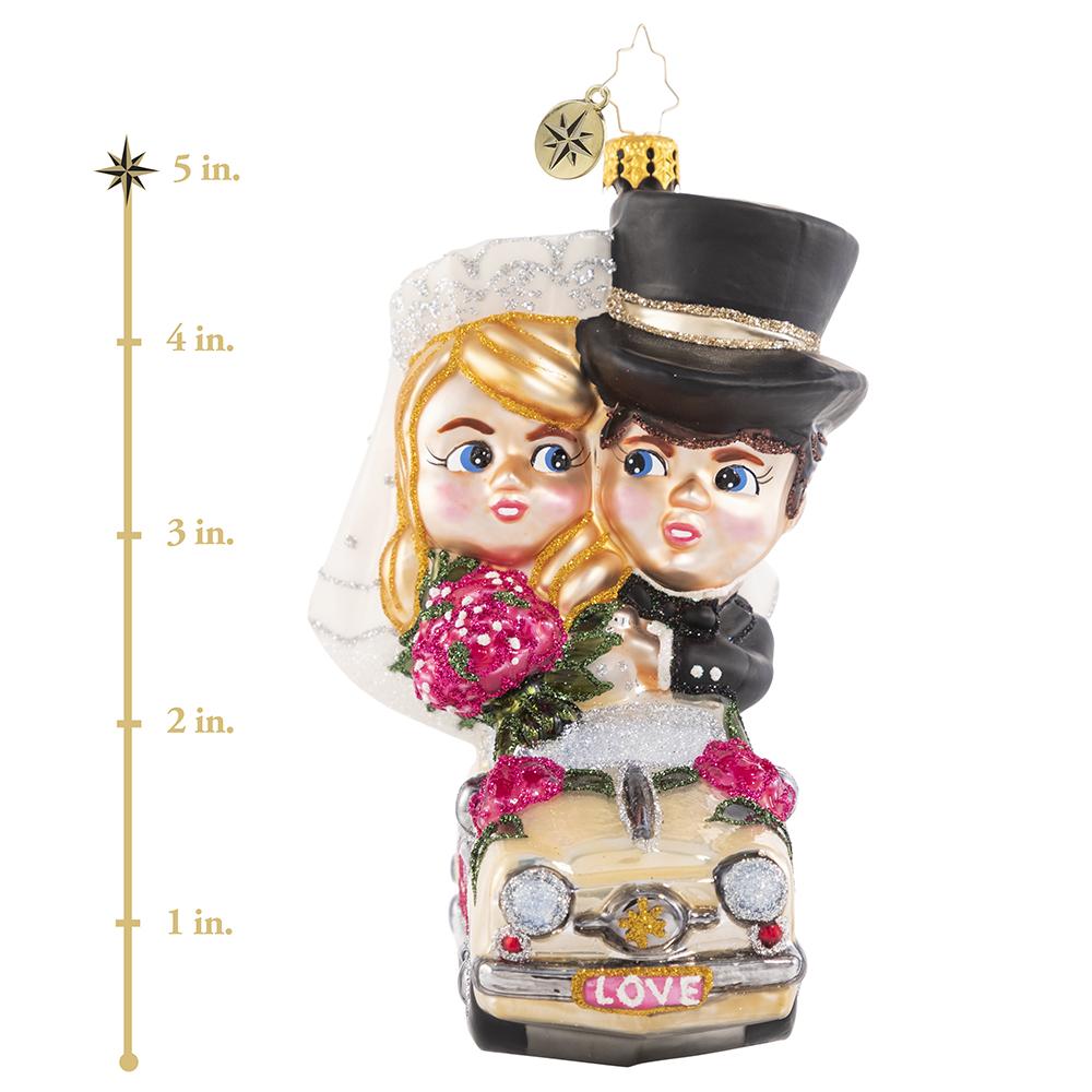 Ornament Description - Riding Merrily in Matrimony: Just Married! These newlyweds are off to their honeymoon in style--we send out best wishes to the new Mr. and Mrs.! This photo shows the ornament is about 5 inches tall. 