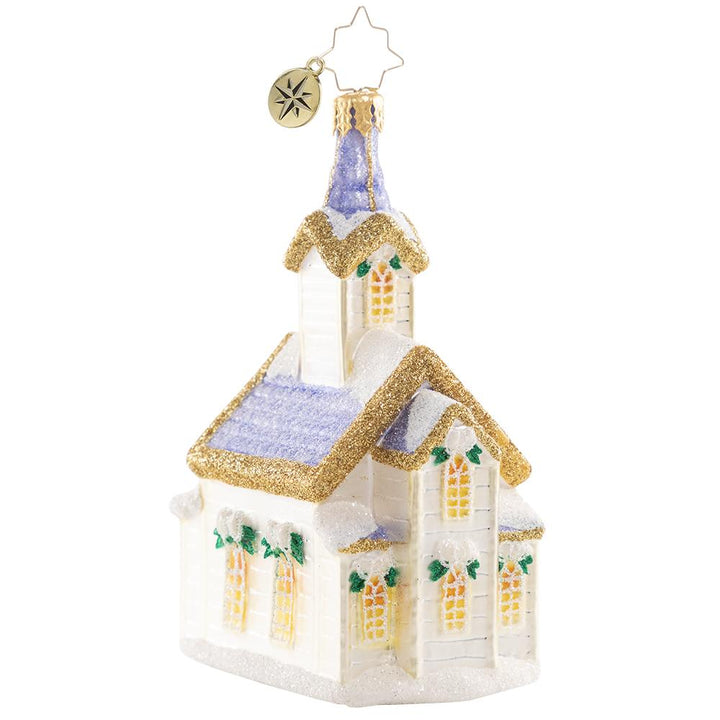 Back - Ornament Description - Peaceful Place of Prayers: Snow begins to fall just as the village church opens its doors for Christmas Eve service. Family and friends gather for prayer and celebration of the season-- it may be snowing outside, but inside this tiny chapel it is warm in more ways than one.