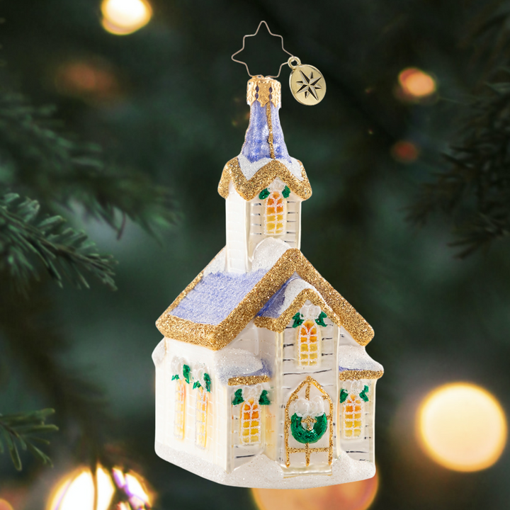 Ornament Description - Peaceful Place of Prayers: Snow begins to fall just as the village church opens its doors for Christmas Eve service. Family and friends gather for prayer and celebration of the season-- it may be snowing outside, but inside this tiny chapel it is warm in more ways than one.