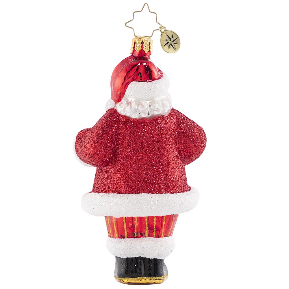 Back - Ornament Description - Cocoa Cravings Claus: There is nothing quite like a creamy cup of hot cocoa to warm up after a snowy night's work at the North Pole. Santa knows it always tastes better out of his favorite holiday cup and with one of Mrs. Claus's freshly baked sugar cookies on the side!