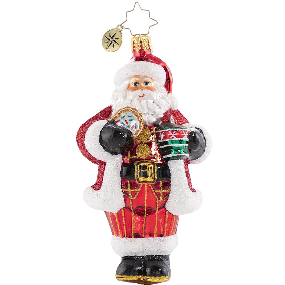 Front - Ornament Description - Cocoa Cravings Claus: There is nothing quite like a creamy cup of hot cocoa to warm up after a snowy night's work at the North Pole. Santa knows it always tastes better out of his favorite holiday cup and with one of Mrs. Claus's freshly baked sugar cookies on the side!