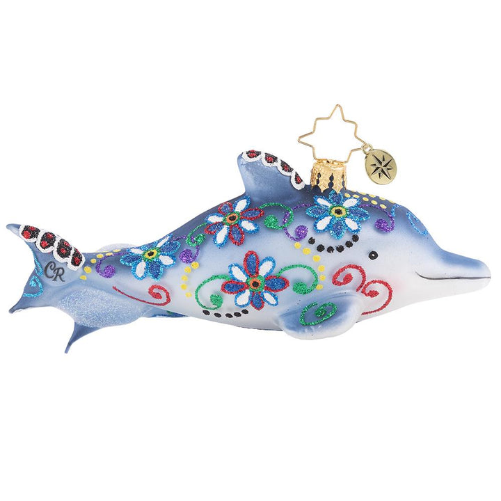 Back - Ornament Description - Swimming Through Florals: This pair of playful dolphins has been gussied up in their finest festive florals of the season. Now they are off to play in the waves!