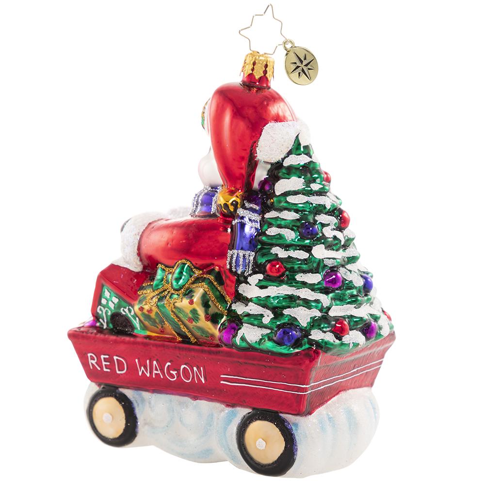 Back - Ornament Description - Wheelin' And Dealin' Snowman: Look at Frosty go! He is wheel-y excited for Christmas and is thumpity-thumping through town in his little red wagon. We hope he got insurance!