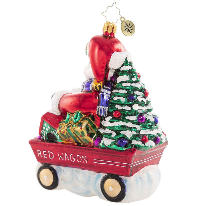 Back - Ornament Description - Wheelin' And Dealin' Snowman: Look at Frosty go! He is wheel-y excited for Christmas and is thumpity-thumping through town in his little red wagon. We hope he got insurance!
