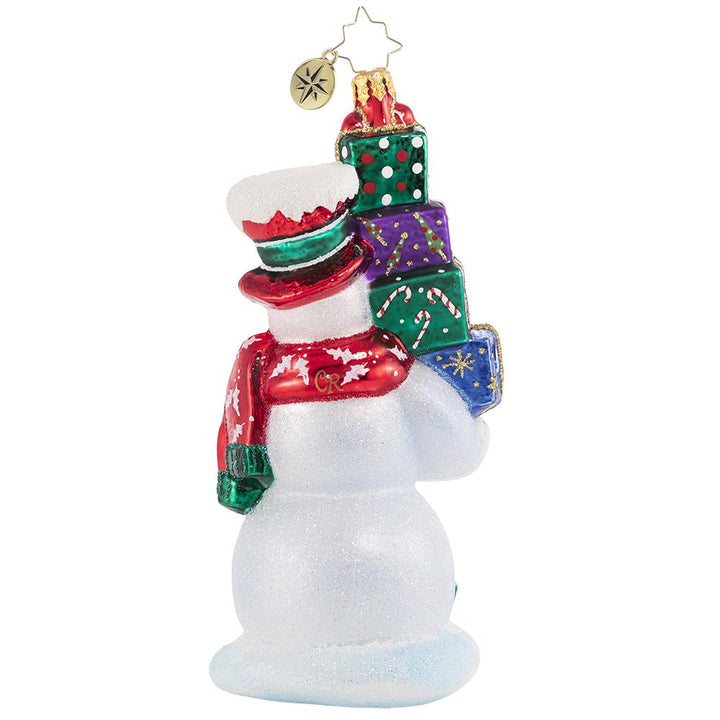 Back - Ornament Description: 2021 Teetering Tower Of Treasures - His shopping is done and his presents are festively wrapped. Mr. Snowman is ready for any and every celebration of the 2021 Christmas season! 