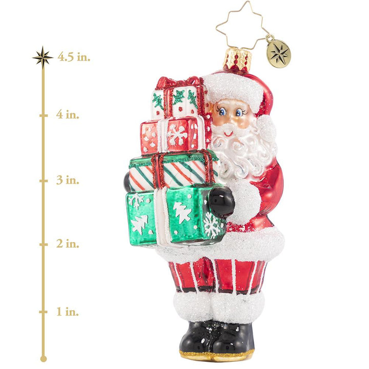 Ornament Description - Time To Celebrate!: Santa is in the spirit! He just could not wait to deliver these festive gifts. Do not worry, he will be back again on Christmas Eve! This photo shows the ornament is about 4.5 inches tall. 