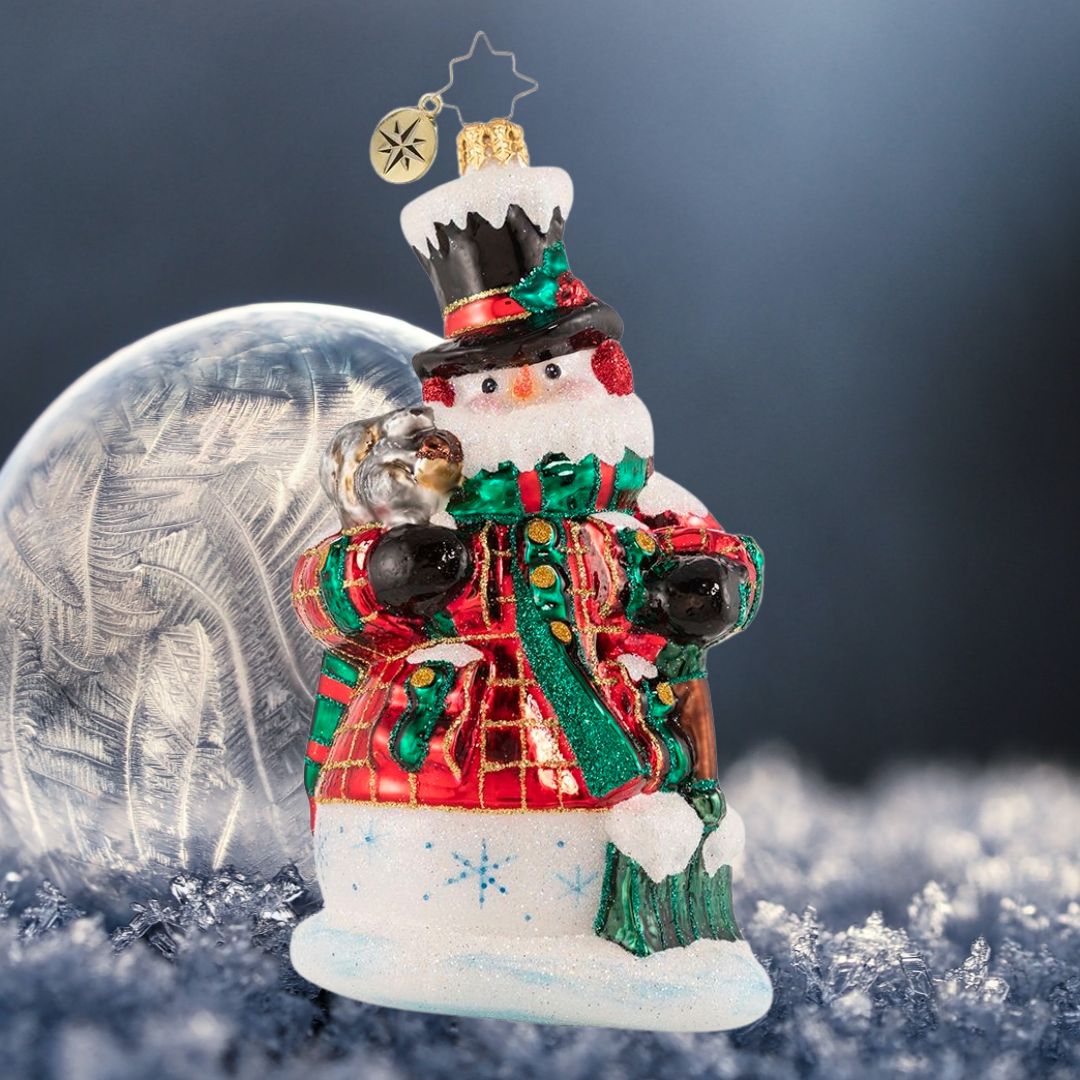 Ornament Description - Fun By The Shovel-Full: Both Frosty and his squirrel friend are nuts about the holiday season! Bundled up against the elements, they help clear the way for Christmas fun.