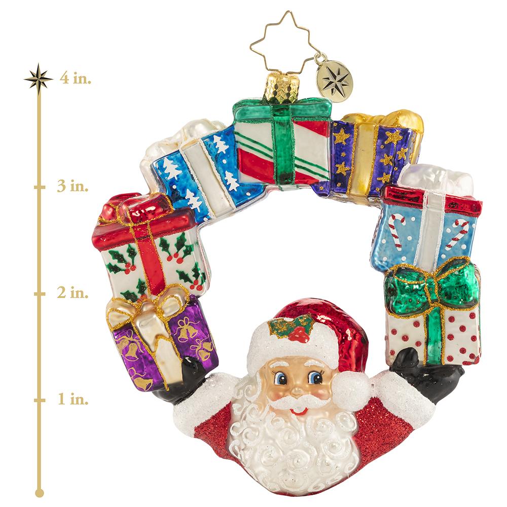 Ornament Description - Ring of Delights: It is all about balance--and Santa always seems to have his hands full. Good thing he is an expert juggler! This photo shows the ornament is about 4 inches tall. 