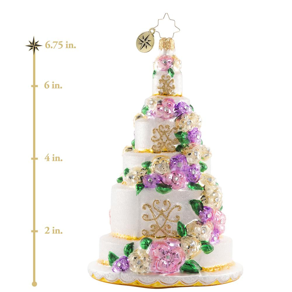 Ornament Description - Six-Tier Celebration: Let them eat cake! Commemorate your "I Do's" with this towering confection and remember that love is sweet! This photo shows the ornament is about 6.75 inches tall. 