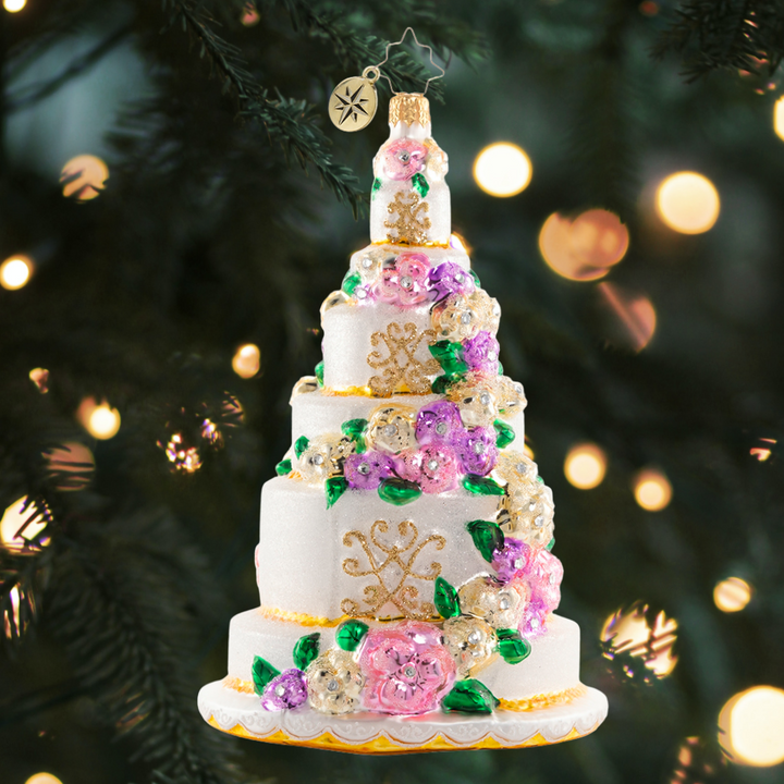 Ornament Description - Six-Tier Celebration: Let them eat cake! Commemorate your "I Do's" with this towering confection and remember that love is sweet!