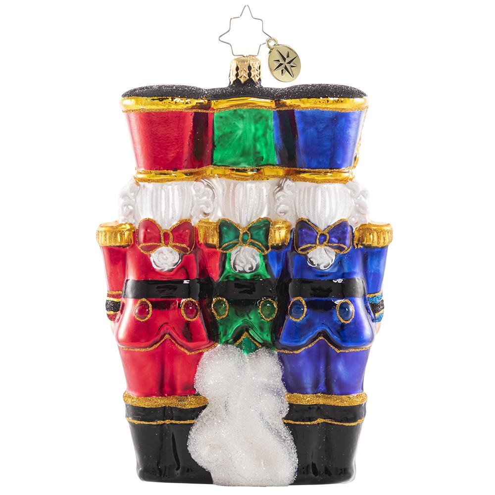 Back - Ornament Description - The Nut-Cracking Pack: These three make a real cracking team! They stand shoulder-to-shoulder in formation as they prepare for their holiday service.