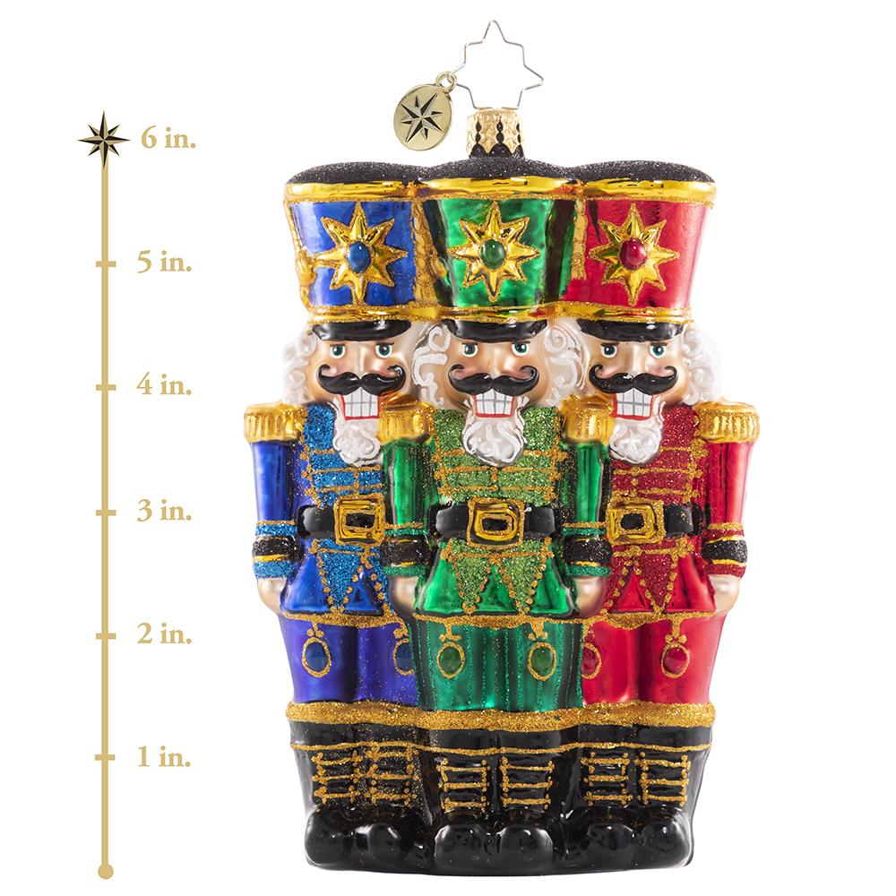 Ornament Description - The Nut-Cracking Pack: These three make a real cracking team! They stand shoulder-to-shoulder in formation as they prepare for their holiday service. This photo shows the ornament is about 6 inches tall., 