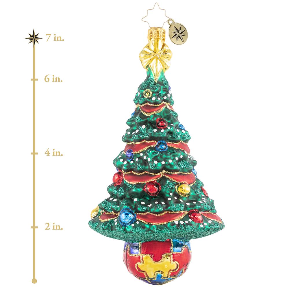 Ornament Description - Puzzle Pieces Pine: Featuring the trademark autism puzzle piece symbol, this beautiful tree is unique and bright just like the special children it represents! A percentage of the sales from this ornament will benefit a charity that raises Autism awareness. This photo shows the ornament is about 7 inches tall. 