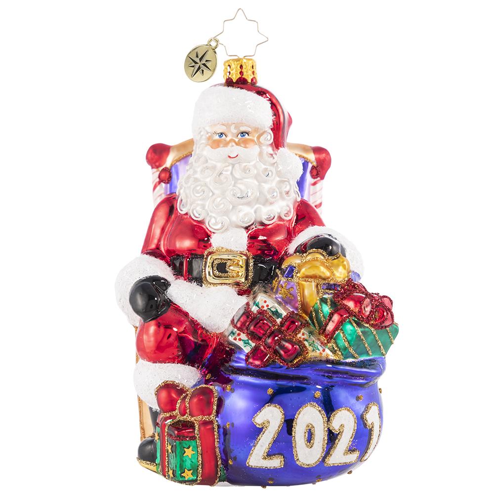 Front - Ornament Description - Kick Back And Relax 2021: The presents have all been delivered and the reindeer are fast asleep in their stalls. Now Santa can finally relax and reflect, which he does best from his biggest, comfiest chair!