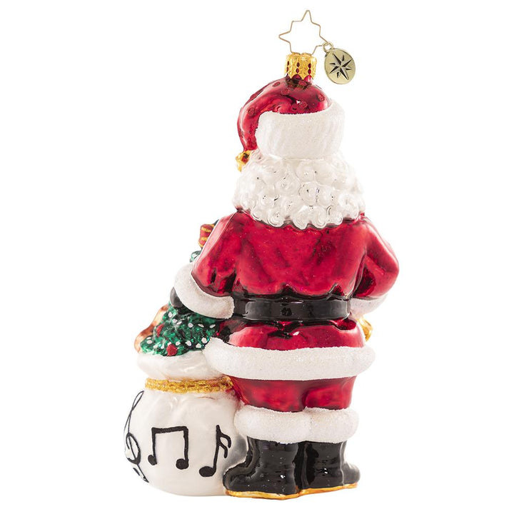 Back - Ornament Description - Holiday Seranade: Santa is ready to perform all your favorite holiday tunes! He is sure to have you Jingle Bell Rockin' around your Christmas tree all season long.