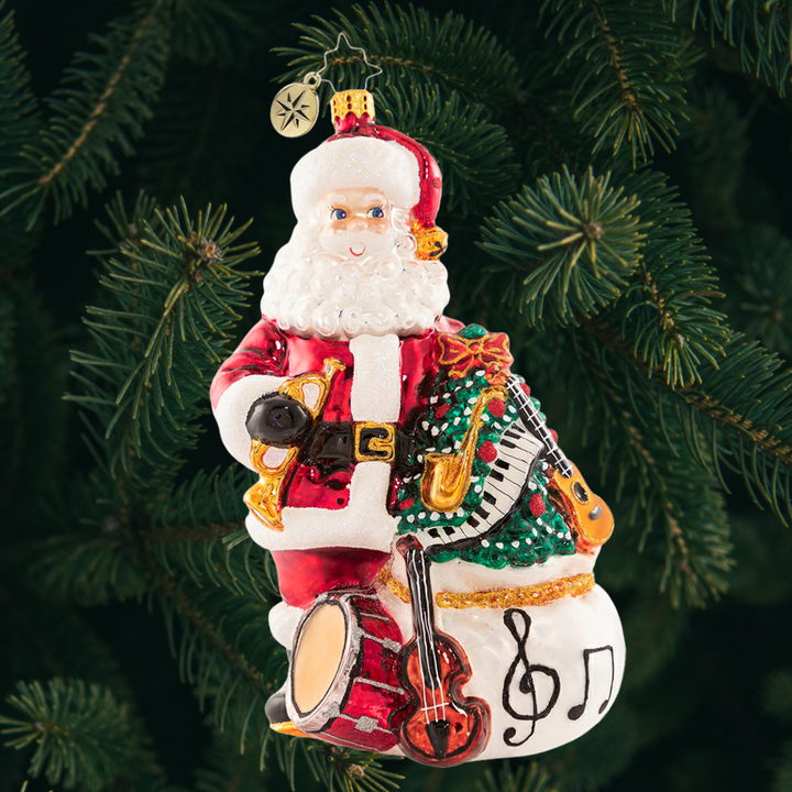 Ornament Description - Holiday Seranade: Santa is ready to perform all your favorite holiday tunes! He is sure to have you Jingle Bell Rockin' around your Christmas tree all season long.