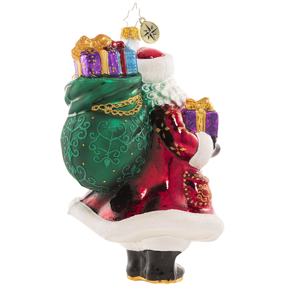 Back - Ornament Description - Top-Shelf Treasures: Santa is pulling out all the stops for his next delivery. He just cannot wait to get this sack of extra-luxe gifts under the tree!