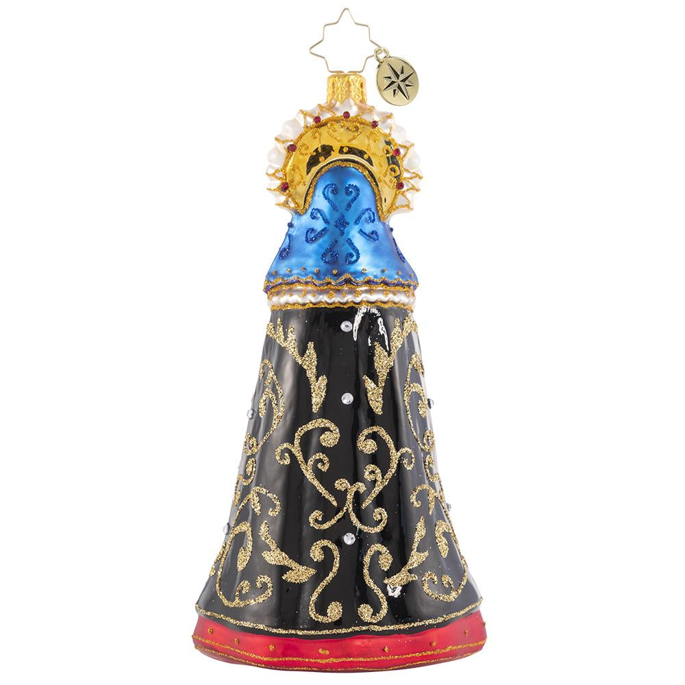 Back - Ornament Description - Lady of Shadows: Diosa mia! Crowned with a gilded flower halo and traditional threads of gold, La Catrina arrives to pay tribute at the altar.