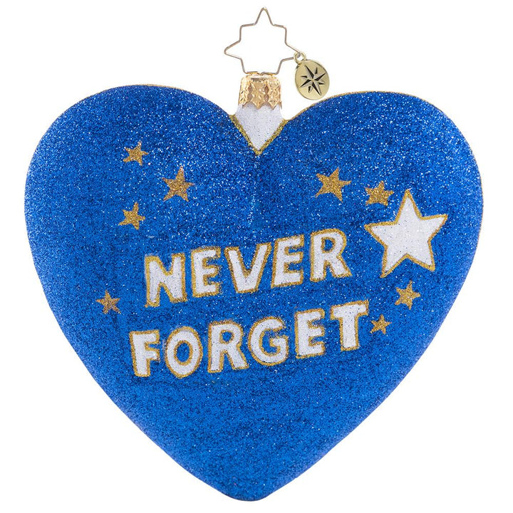 Back - Ornament Description - Heart of America: The tragic events of September 11, 2001 shocked and united America like never before. This heartfelt keepsake symbolizes the unbreakable heart of the American spirit, and a tribute to every life lost. A percentage of proceeds from the sale of this ornament will go to a charity that supports 9/11 survivors, first responders, and their families. We will never forget!