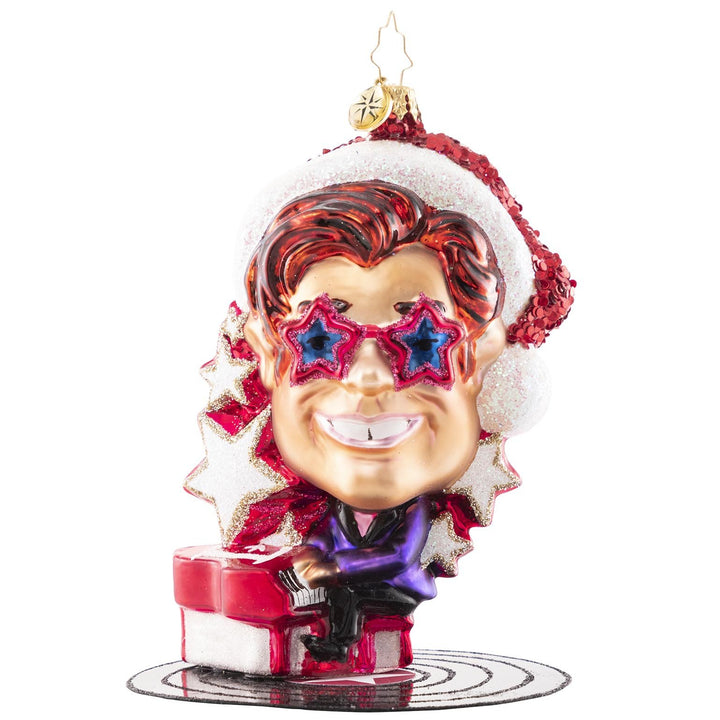 Front - Ornament Description - Elton John's Center Stage: Donning a Santa hat and his signature shades, Elton John takes center stage for a holiday concert of some of his greatest hits. He is ready to Step Into Christmas and will have the crowd Crocodile Rockin' in no time!