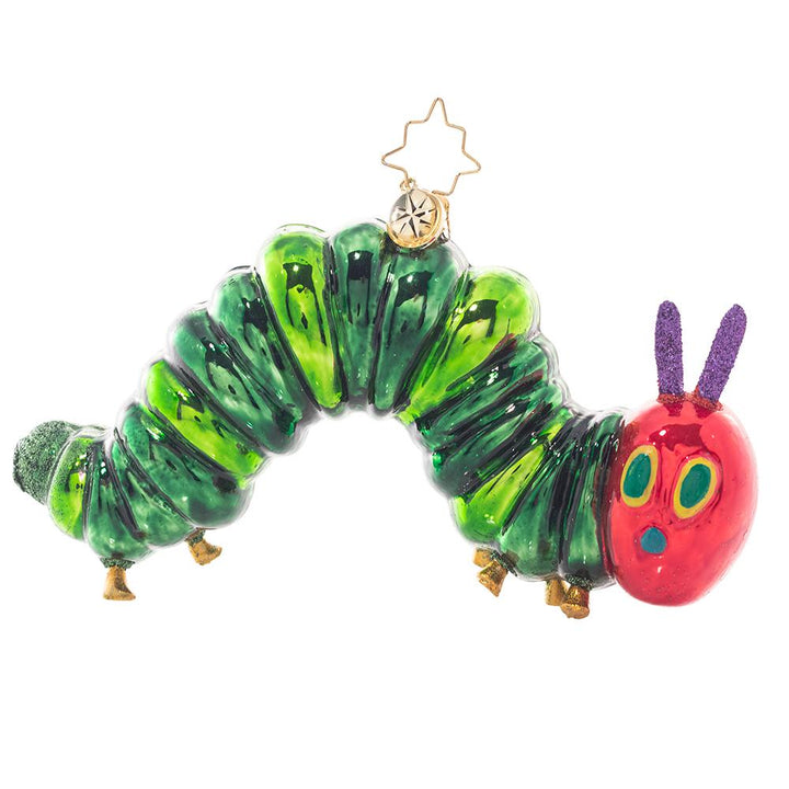 Front - Ornament Description - It all started with one apple. The Very Hungry Caterpillar™ has inspired generations to discover and explore the world around them. Let this unique piece inspired by Eric Carle’s art spark your imagination and color your life! © 2021 Penguin Random House LLC. ERIC CARLE, THE VERY HUNGRY CATERPILLAR, THE WORLD OF ERIC CARLE logo,
